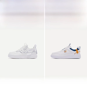 Detail view of white leather skate shoes with mesh panels and durable flat rubber soles