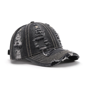 Distressed denim baseball cap with vintage frayed holes and contrast stitching in dark grey
