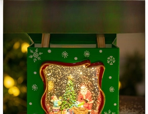Detailed view of vintage green Christmas lantern with Santa and warm LED lights