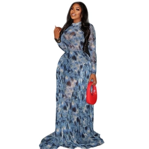 Slim fit high neck maxi dress in blue abstract tie-dye print with red handbag