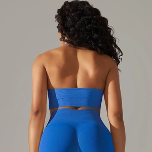 Back view of cobalt blue ribbed seamless yoga set showing racerback top and leggings