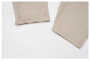 Detailed close-up of the double-stitched hem on high-elastic knit yoga trousers