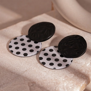 Retro acrylic black and white polka dot round earrings with black matte stud finish