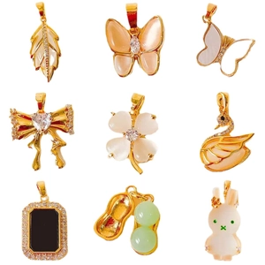 Selection of 18k gold plated necklaces with clover, butterfly and pearl pendants