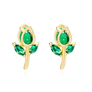 Close-up of golden tulip earrings featuring sparkling green crystal petals and leaves