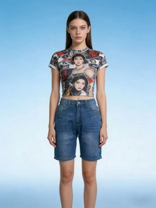 Front view of women's slim-fit casual denim shorts paired with a graphic crop top