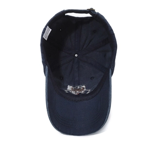 Navy blue washed cotton baseball cap with adjustable metal buckle and interior details