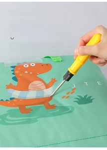 Detail of durable green oxford fabric with cute dinosaur showing scratch resistance