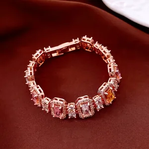 Luxurious rose gold link bracelet with pink and champagne square-cut zircons and halo stones