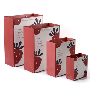 Starry sky themed red and white strawberry paper gift bags in four sizes with rope handles