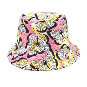 Detail of pink butterfly print bucket hat with reinforced stitching on the canvas brim