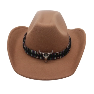 Detailed view of a brown felt cowboy hat featuring a tribal band and bull skull.