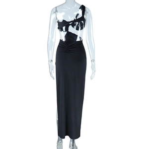 Detail of black one-shoulder dress with sexy waist cutout and pleated fabric texture