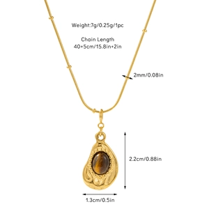 Detailed view of water drop tiger eye pendant on a golden snake chain with dimensions