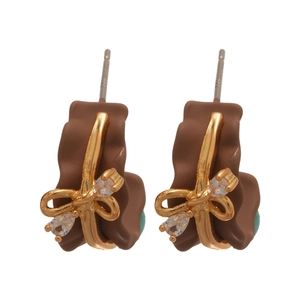 18k gold plated C-shaped earrings with chocolate brown bow and crystal accents