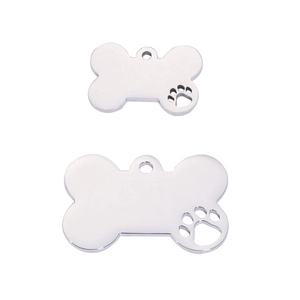 Polished stainless steel dog bone tags with hollow paw print in two different sizes