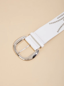 Close-up of white PU leather belt featuring silver D-ring buckle and decorative metal studs