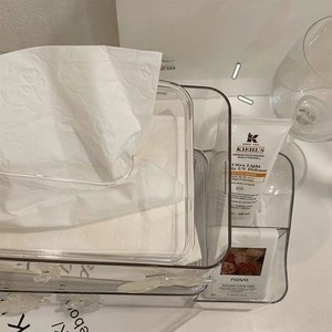 Close-up of a clear acrylic multi-functional storage box with dustproof lid and drawers