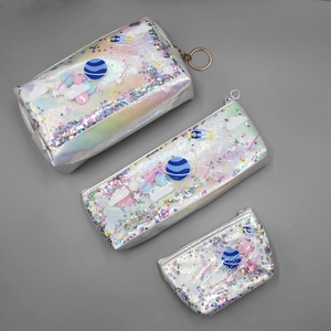 Detailed set of three holographic glitter storage bags with planet and star patches