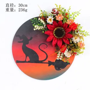 Detail of Halloween moon cat wreath with black cat silhouette on a 30cm wooden frame
