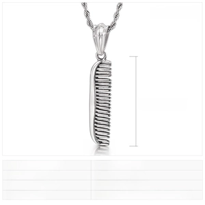 Close-up of stainless steel comb pendant with twist chain showing dimensions and specs