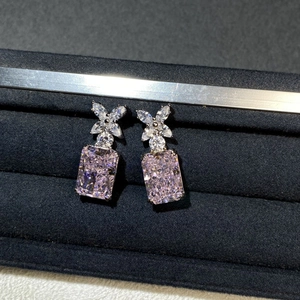 Elegant S925 sterling silver earrings with floral crystals and radiant pink gemstone