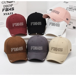 Showcase of seven cotton baseball caps with FBXS embroidery in various vibrant colors