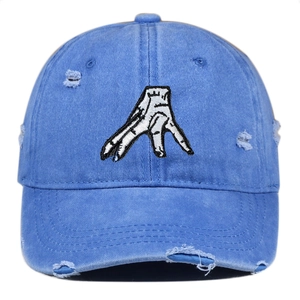 Distressed blue washed cotton baseball cap with white hand embroidery and ripped details