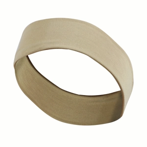 Close-up of the beige elastic fabric texture on a professional athletic sports headband