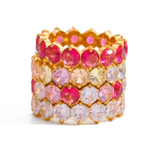 Stackable eternity rings with colorful round-cut cubic zirconia in golden settings