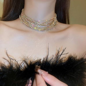 Luxurious multi-layer gold choker necklace with sparkling crystals and a starry shine