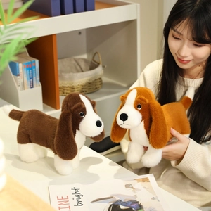 Cute beagle dog plush toy in brown and white standing on a cozy indoor background