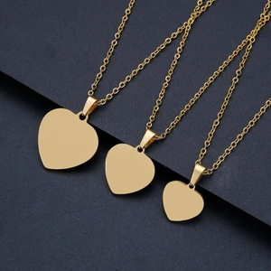 Polished gold stainless steel heart pendant necklaces in small, medium, and large sizes
