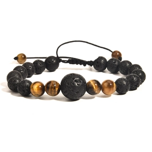 Macro detail of adjustable braided lava stone and tiger eye beaded bracelet set
