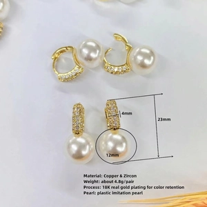 Elegant gold U-shaped pearl earrings with cubic zirconia inlay for women