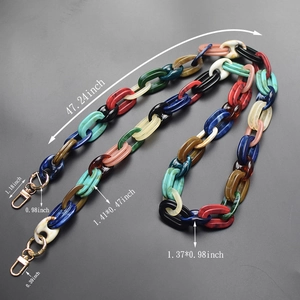 Colorful acrylic bag strap detail with gold clasps and multi-size resin link dimensions