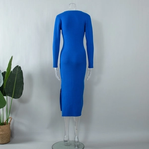Detail showing the back view and side slit of this blue rib-knit bodycon midi dress
