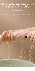 Close-up of pink coral fleece towel being wrung out to show high water absorption