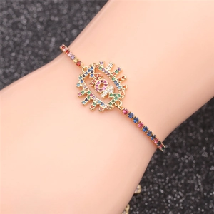 Gold MOM bracelet with colorful zircons on a model wrist for Mother's Day gift