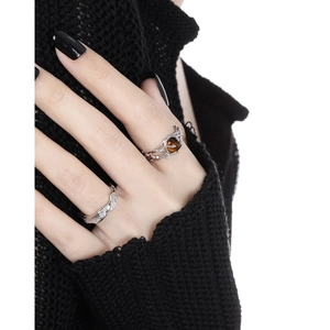 S925 sterling silver hollow vine ring set with amber tiger stone on model hand