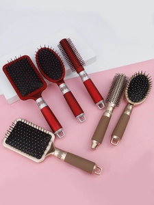 Detail of premium 6-piece hairbrush set with hanging hooks and metallic finish