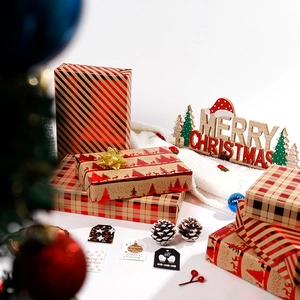 Premium red and gold foil Christmas gift wrapping paper kraft rolls with festive patterns