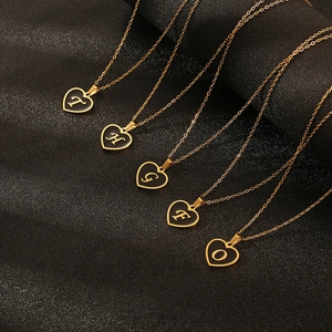 Golden stainless steel heart-shaped initial necklaces with black enamel background