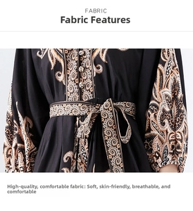 Detail of bohemian paisley print dress featuring matching waist tie and button closure