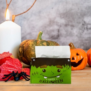 Halloween Frankenstein tissue box cover with festive pumpkin and spider decorations