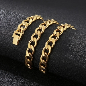 Detailed view of golden stainless steel Cuban chain necklace with jewelry clasp