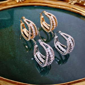 Luxurious geometric zircon pave hoop earrings in gold and silver finish for women