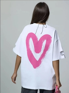 White oversized drop shoulder T-shirt with pink heart print on the back for women