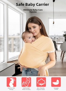 Close-up of baby wrap carrier made of organic cotton fabric in modern home setting