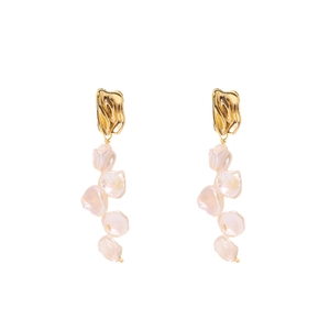 Elegant gold fringe earrings featuring pink baroque pearls on a clean white background